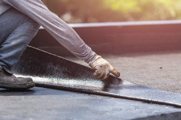 Professional Waterproofing technician working in Cliffside Park, NJ